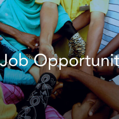 A group of diverse hands joined together with the text "Job Opportunity" overlaid.